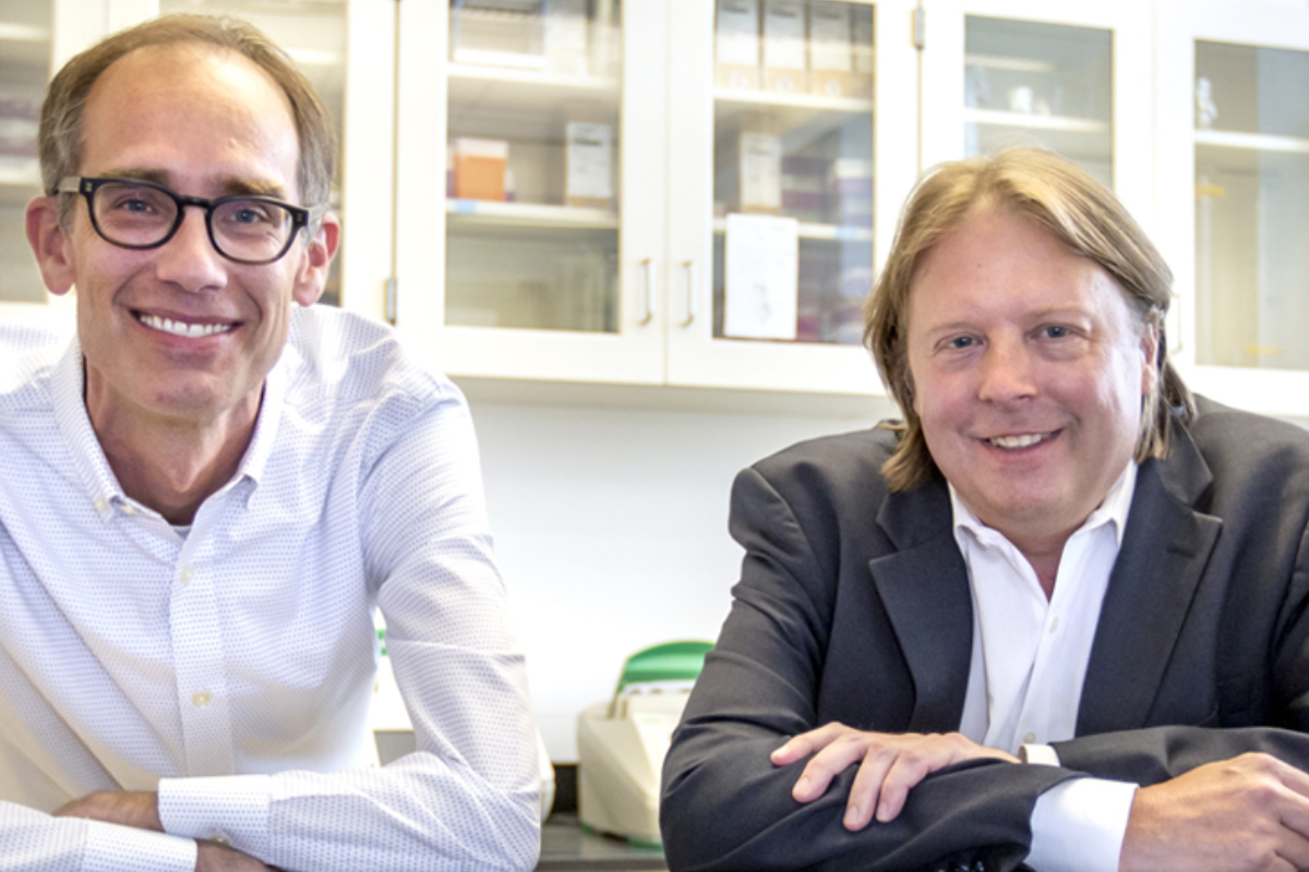 Researchers Dan Janies and Adam Reitzel in lab