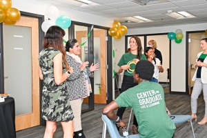 Graduate students and staff in Center for Graduate Life and Learning space