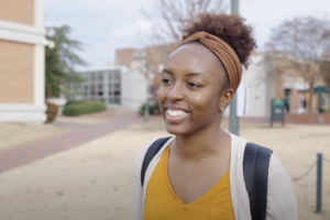Ebony Gaillard, Ph.D. Candidate walking on campus